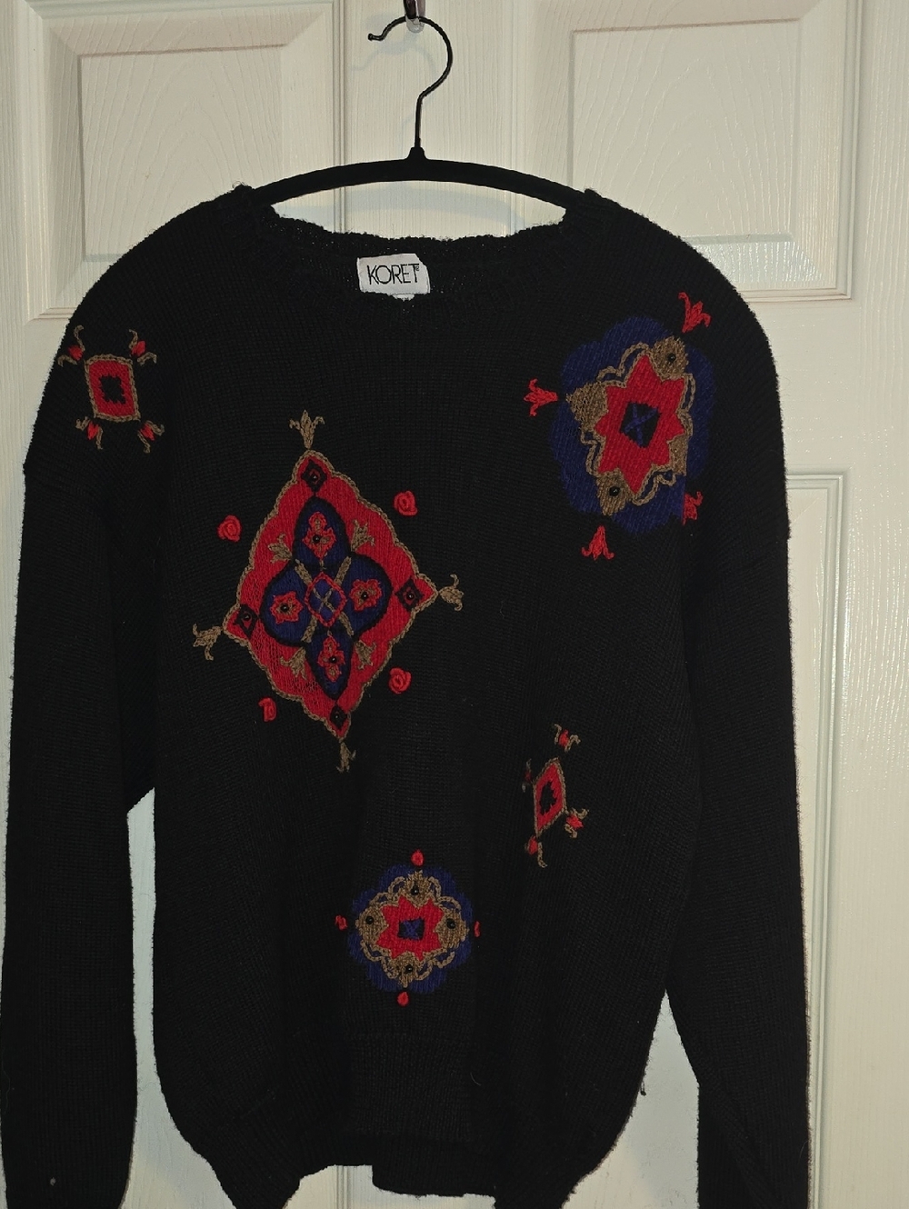 Koret Black Crewneck Sweater with Red, Blue & Gold Embroidery‎ Accents